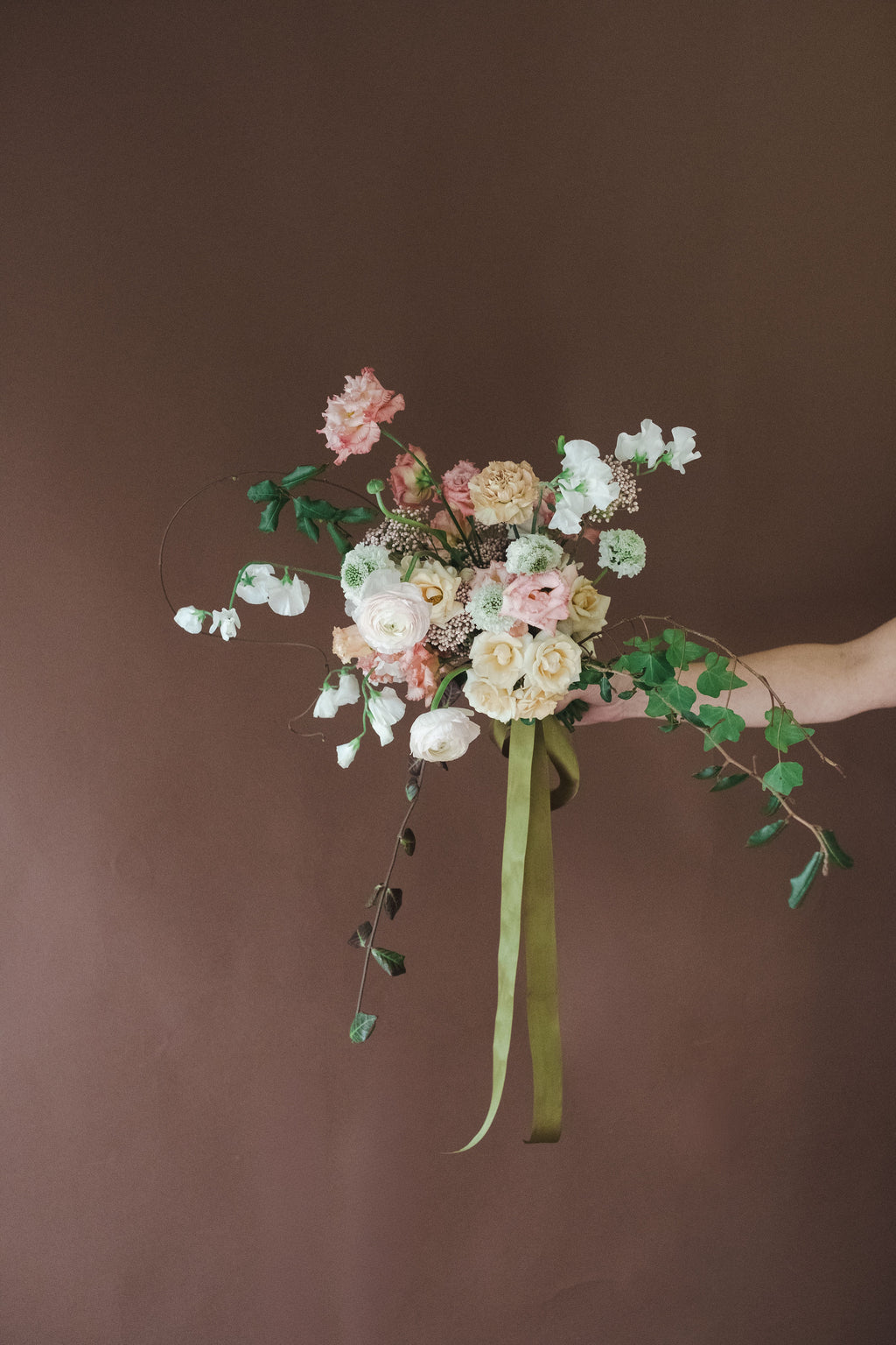 Whimsical garden style bouquet from modern retail flower shop in Madison, Alabama.