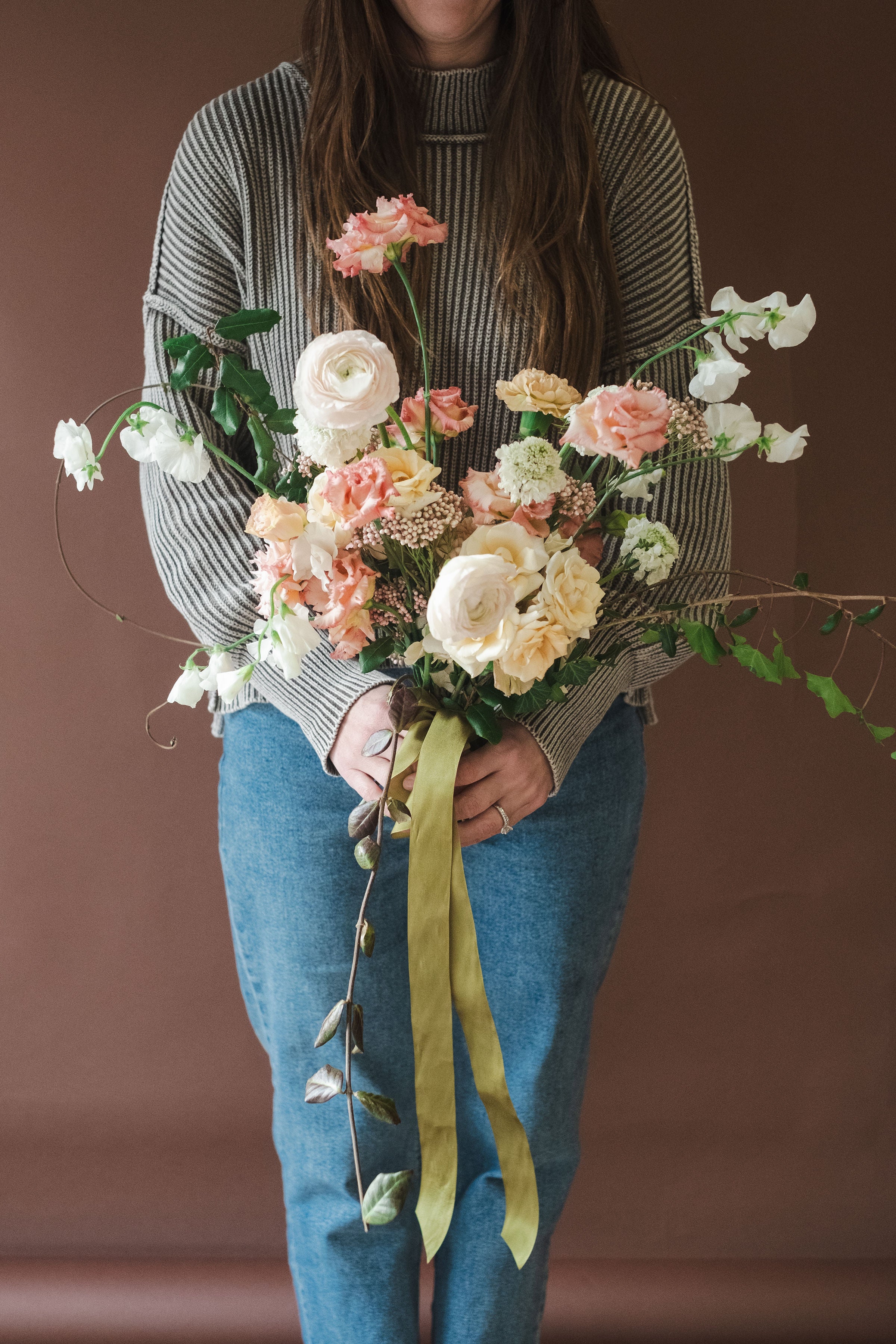 Whimsical bridal bouquet from The Dreamt Garden, a modern flower shop in downtown Madison AL.