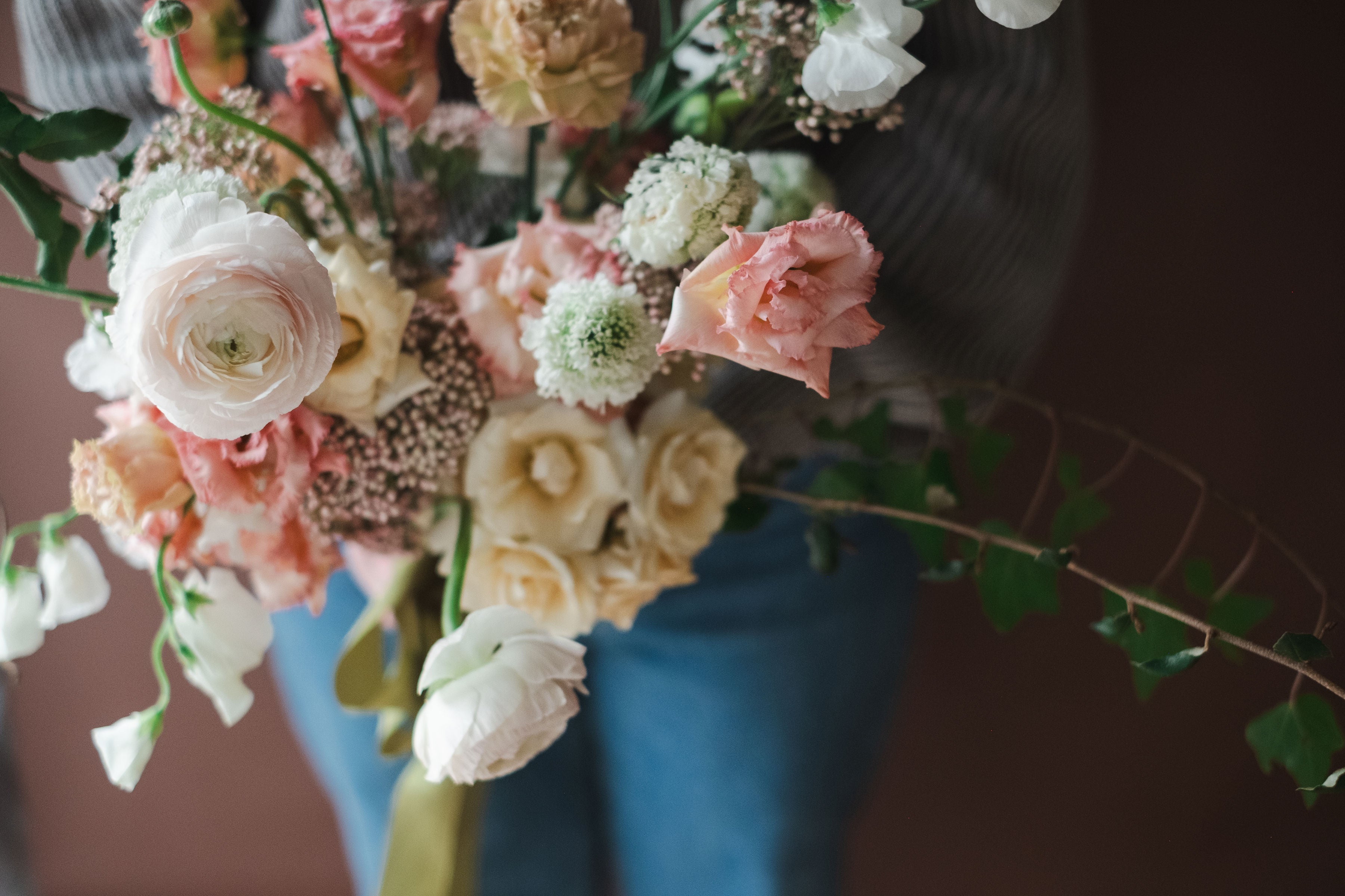 Ranunculus, Roses, Sweet Peas and garden flowers in Bridal Bouquet from The Dreamt Garden.